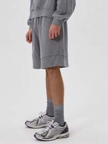 Musero Pantalones cortos jogger de doble capa