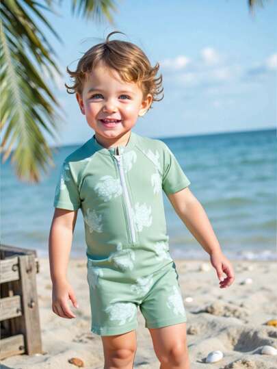 SHEIN Baby Boy Cartoon Sea Turtle Pattern Short Sleeve One-Piece Swimsuit, Suitable For Summer Beach, Pool, Swimwear
