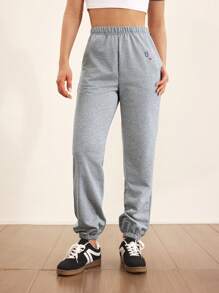 Cheerettes Pantalones de chándal casuales con cintura elástica y bolsillos con estampado de letras para mujeres