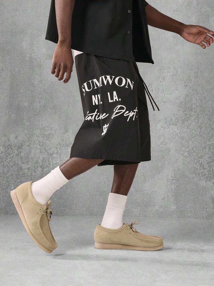 Pantalones cortos con detalle de estampado de texto