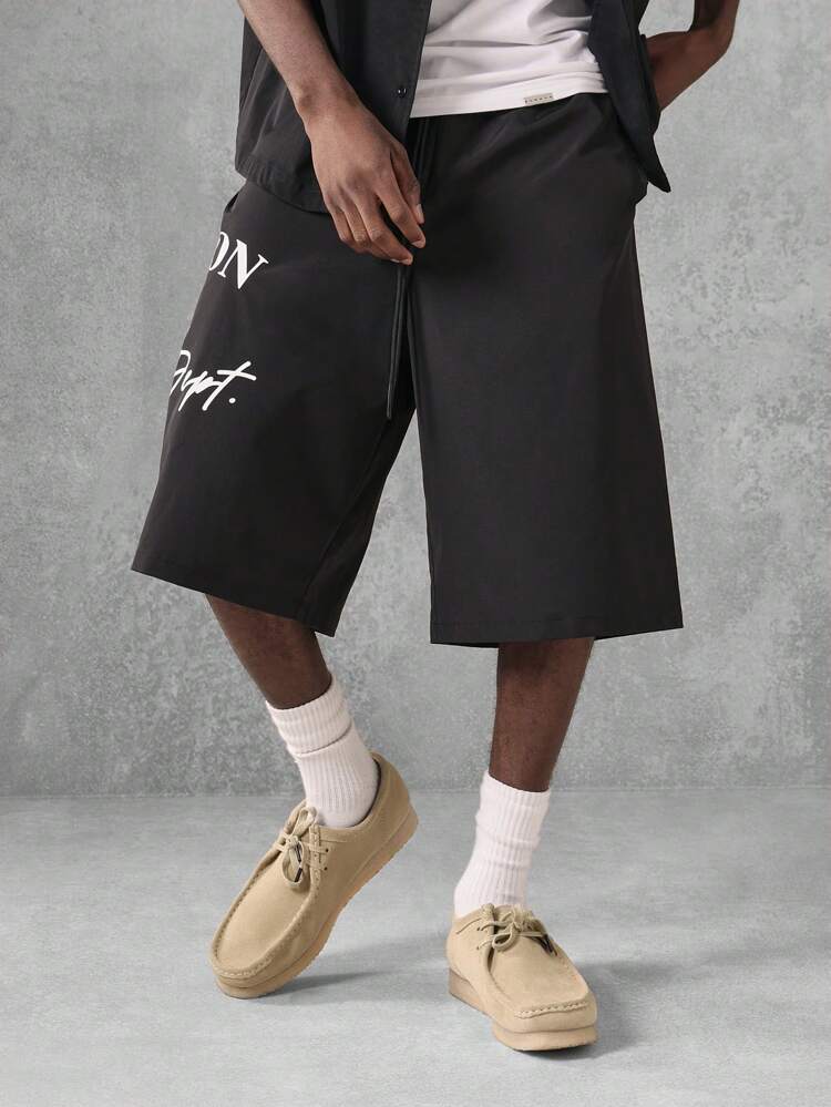 Pantalones cortos con detalle de estampado de texto