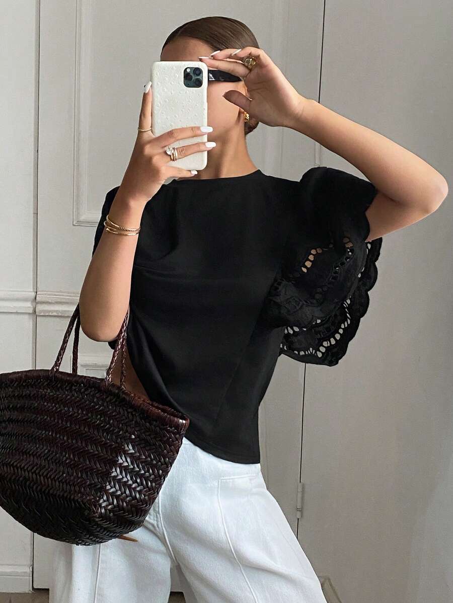 Serisse Áo thun nữ cơ bản màu trơn, kiểu dáng thường ngày, thêu họa tiết, khoét lỗ, phối màu, thích hợp cho mùa xuân và mùa hè, thời trang mặc hàng ngày, áo tay bồng thêu họa tiết, vải thun dệt kim màu đen, áo thun đen dáng rộng thoải mái, thanh lịch và thời trang khi đi làm, áo tay cánh dơi, áo thun buộc dây, kiểu dáng Pháp mùa lễ hội - màu đen - Xem 1