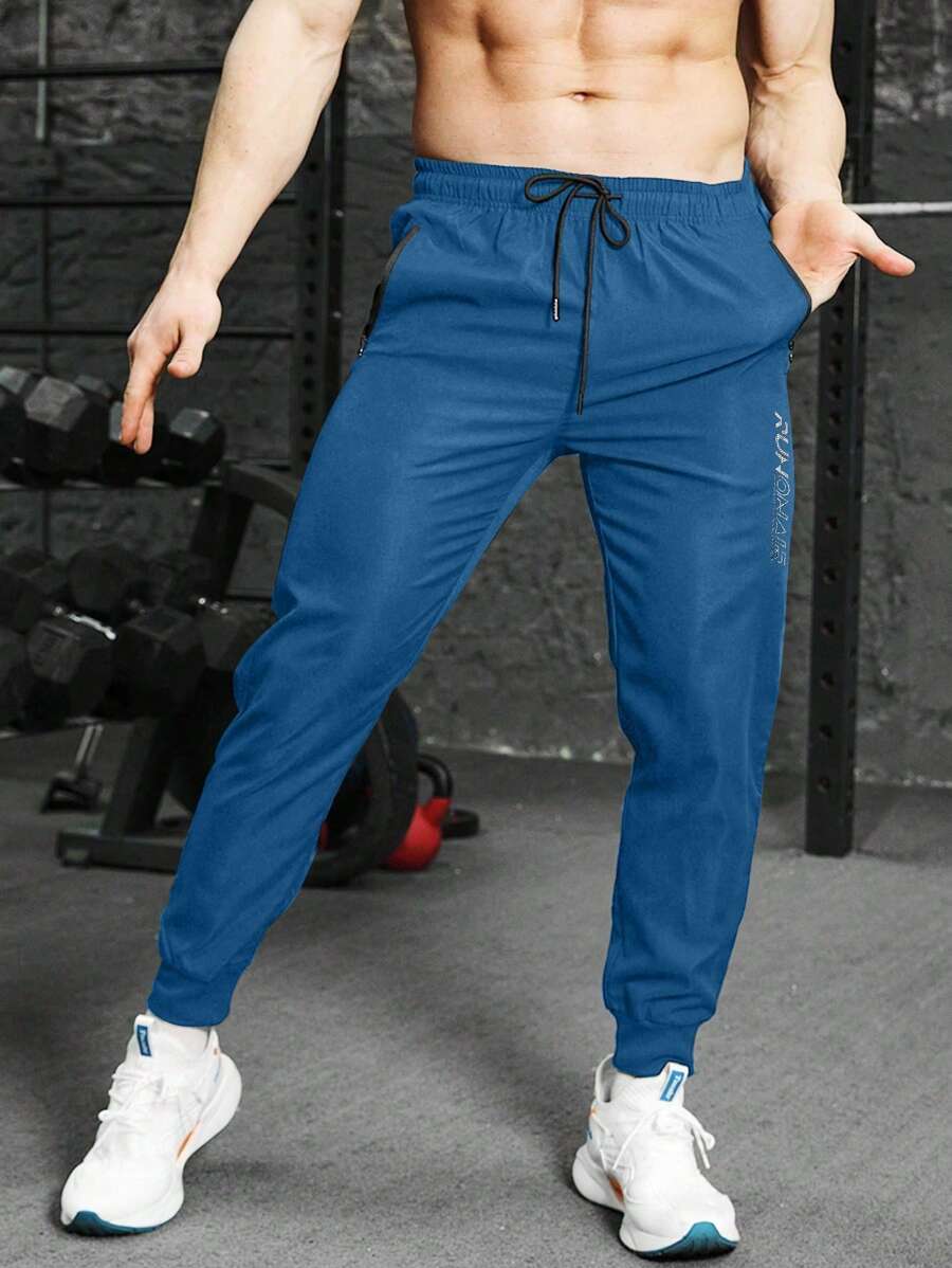 Gym Rark Men's Blue Long Fabric Sports Pants With Zipper Pockets For Workout Sweat Pants - Blue - View 1