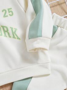 Conjunto de top con cuello polo y pantalones de bloques de color para niño bebé