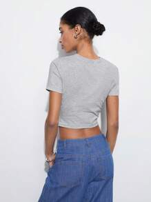 Maija Camiseta casual con diseño asimétrico retorcido para mujer, tejida ajustada y cómoda con un solo hombro retorcido y drapeado, prendas de vestir informales y urbanas para primavera temprana, atuendo callejero para mujer, prendas de vestir hippie para vacaciones de primavera