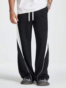 Manfinity NXTstreet Pantalón de chándal holgado de punto con bloques de color para hombres - Negro - Ver 1