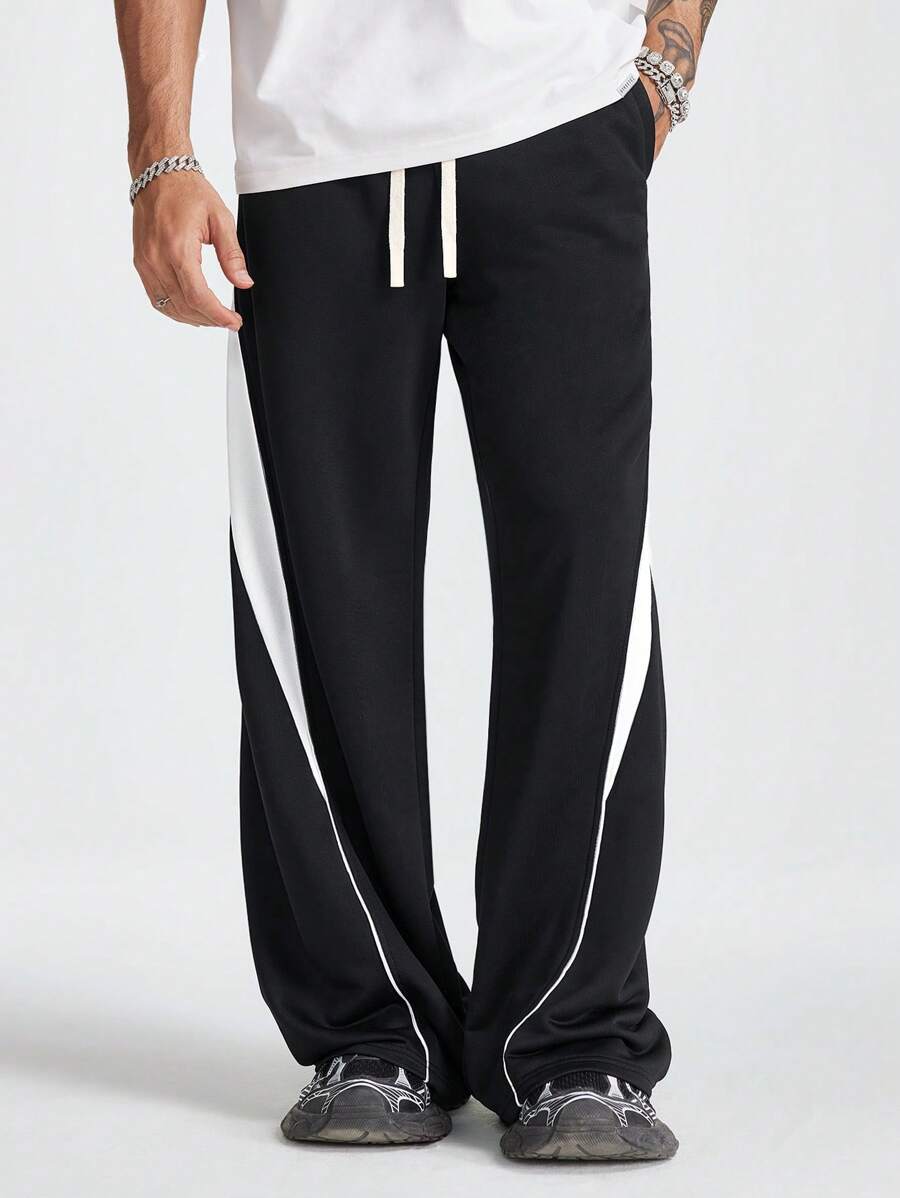 Manfinity NXTstreet Pantalón de chándal holgado de punto con bloques de color para hombres - Negro - Ver 1