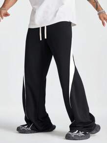 Manfinity NXTstreet Pantalón de chándal holgado de punto con bloques de color para hombres - Negro - Ver 4