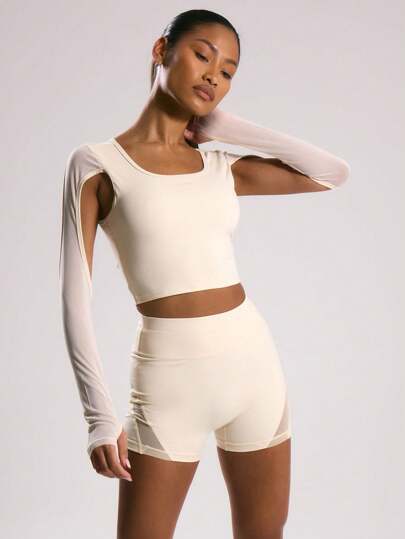 Musera Sport 运动网眼拼接长袖露脐上衣，适合板式网球、网球、匹克球等运动和健身。