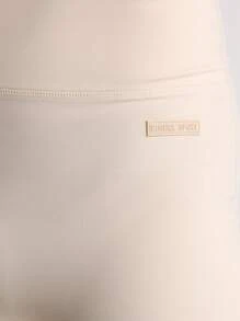 Musera Sport 高腰缝线细节修身Logo拼接运动紧身裤，适合板式网球、网球、匹克球、健身房、秋季瑜伽、普拉提、日常休闲穿着。