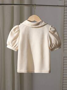 Zomers modieus en elegant geplooide kraag pofmouw T-shirt top, jong meisje