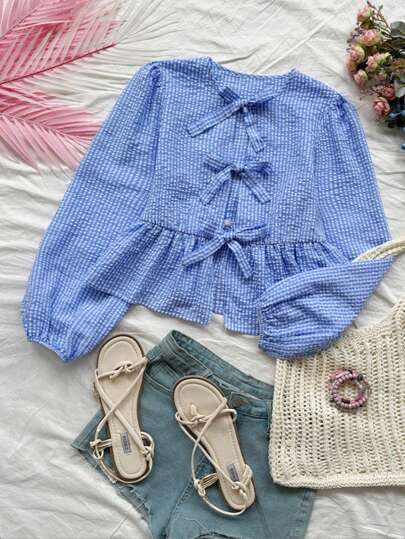 SHEIN Camisa casual de manga larga con cuello redondo, decoración de lazo, para uso diario de niñas adolescentes en verano/primavera. Blusas sueltas con mangas de obispo, volantes en el bajo, cuello redondo, para uso casual diario de mujeres con lazo, nudo y volantes.