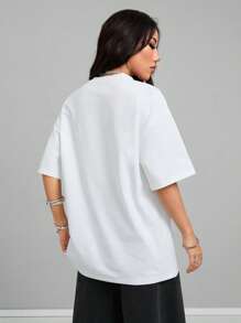 Coolane Camiseta blanca de corte oversize con estampado vintage grunge para mujer primavera verano