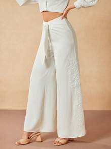 Oxana Quần ống rộng màu trắng dệt kim thắt lưng thêu ren xoắn thắt nút cho lễ hội Brunch dành cho nữ - trắng - Xem 1