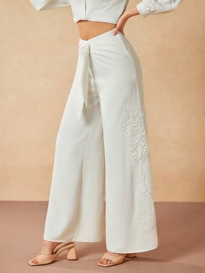 Oxana Pantalones de mujer con cinturón de punto ancho, bordado de encaje y lazo retorcido, diseño para festival y brunch