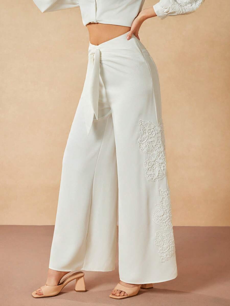 Oxana Quần ống rộng màu trắng dệt kim thắt lưng thêu ren xoắn thắt nút cho lễ hội Brunch dành cho nữ - trắng - Xem 1