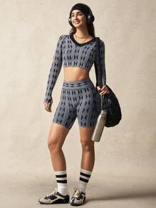 VARSITIE Women's Solid Color Splice Long Sleeve Crop Top And Shorts Sports Suit - Black and White - View 1