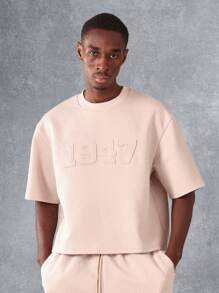 SUMWON Conjunto deportivo co-ord con camiseta corta oversize a juego con pantalones cortos de tiro caído con textura estriada, ropa informal, entrenamiento, urban streetwear, conjunto casual de verano