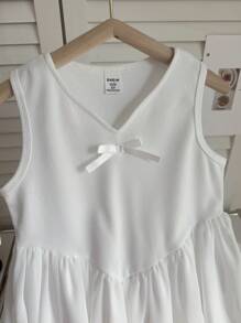 Nuevo vestido de verano elegante para niñas con escote en V, sin mangas, con gran vuelo y adorno de lazo. Vestido de fiesta de princesa para niñas jóvenes. - Blanco - Ver 7