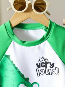 Young Boy Printed Two-Piece Swimsuit Set Young Boys Two-Piece Swim Set: Round Neck Short Sleeve Rash Guard With Fun Alligator Print And Matching Swim Shorts - Regular Length Toddler Boys' Tropical Swimsuit Set: Multicolor Alligator Print Short Sleeve Regular Length Perfect For Summer Fun - Multicolor - View 5