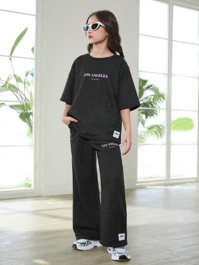 SHEIN Tween 女童休闲简约纯色印花垃圾摇滚音乐节宽松插肩针织圆领运动衫和印花运动裤套装，2 件套服装，宽松版型，春秋