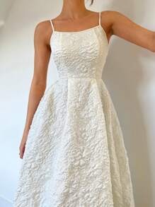 Chiquease 女式杏色细肩带公主线高腰喇叭形长裙，带纹理花卉图案