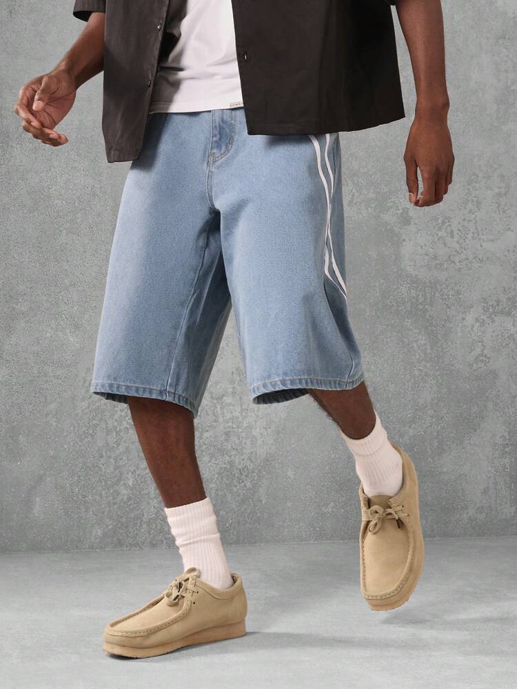 Pantaloncini in denim chiaro effetto used, lunghezza bermuda