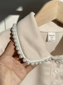 Zomers modieus en elegant geplooide kraag pofmouw T-shirt top, jong meisje