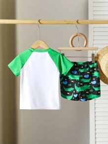 Young Boy Printed Two-Piece Swimsuit Set Young Boys Two-Piece Swim Set: Round Neck Short Sleeve Rash Guard With Fun Alligator Print And Matching Swim Shorts - Regular Length Toddler Boys' Tropical Swimsuit Set: Multicolor Alligator Print Short Sleeve Regular Length Perfect For Summer Fun - Multicolor - View 2
