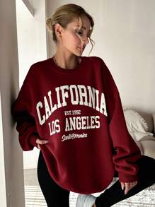 Bluza z bawełny z wzorem liter i opadającymi ramionami