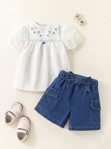 SHEIN Set de 2 piezas con top de manga corta y abullonada de cuello redondo y pantalones cortos con estampado floral para niña - Multicolor - Ver 4