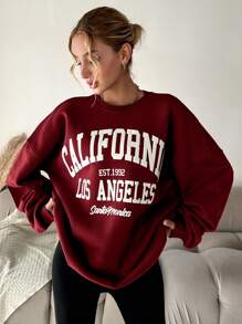 Bluza z bawełny z wzorem liter i opadającymi ramionami