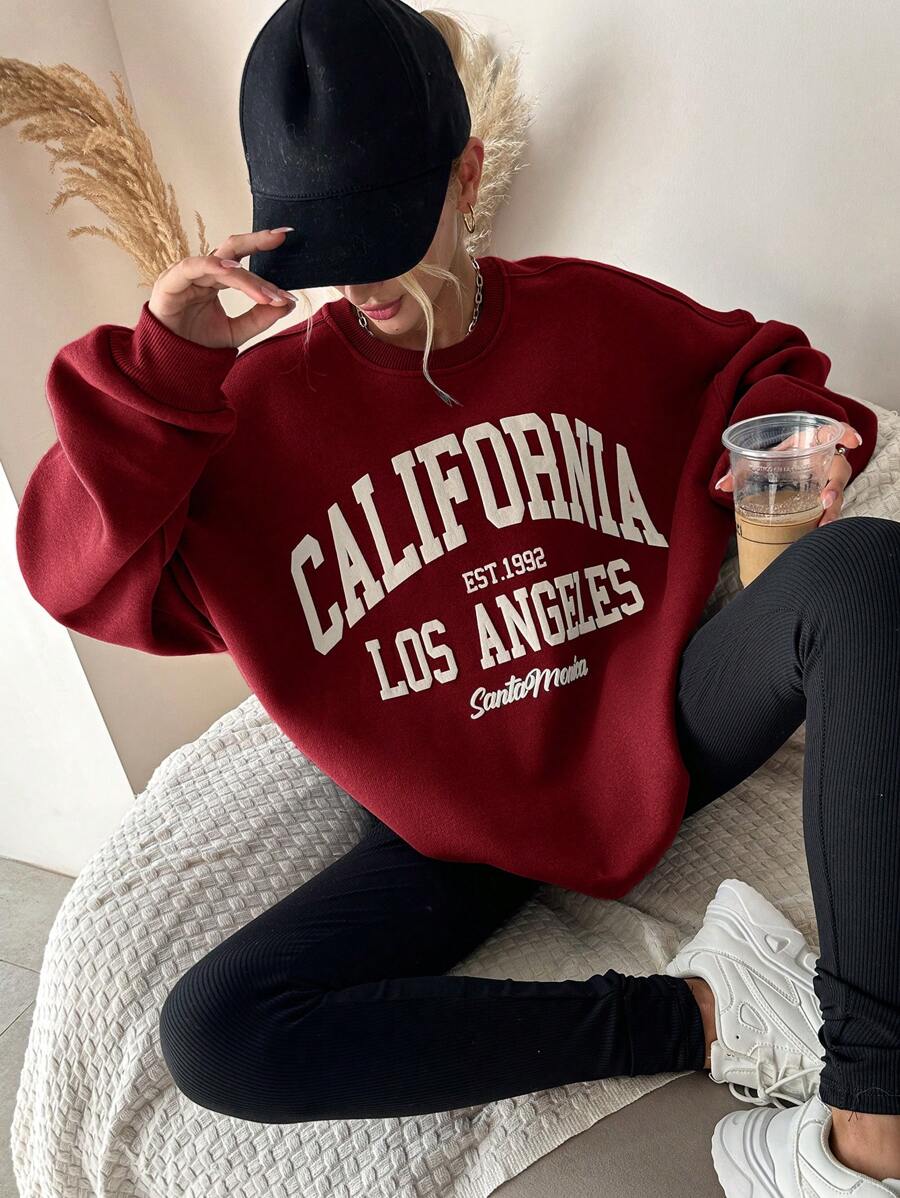 Bluza z bawełny z wzorem liter i opadającymi ramionami