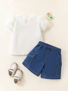 SHEIN Set de 2 piezas con top de manga corta y abullonada de cuello redondo y pantalones cortos con estampado floral para niña - Multicolor - Ver 2