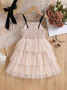 فستان كيك شابة حلو و جميل، بلون المشمش، مزين بفيونكة سوداء مفصلة، تنورة متكدسة من التول، سيلويت على شكل حرف A أنيق، مناسب للخارج والكاجوال والحفلات وأكثر المناسبات - لون مشمشي - مشاهدة 2