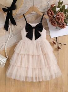 فستان كيك شابة حلو و جميل، بلون المشمش، مزين بفيونكة سوداء مفصلة، تنورة متكدسة من التول، سيلويت على شكل حرف A أنيق، مناسب للخارج والكاجوال والحفلات وأكثر المناسبات - لون مشمشي - مشاهدة 7