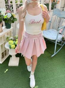 SHEIN Conjunto de 2 piezas de falda mini plisada con decoración de lazo y tirantes, estilo casual y cómodo para adolescentes - Blanco - Ver 7