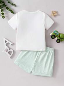 SHEIN Set de 2 piezas de pijama cómodo para niño/bebé: Camisa de manga corta con estampado verde a cuadros y de animales, y pantalones cortos - Verde - Ver 2