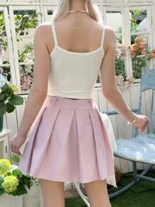 SHEIN Conjunto de 2 piezas de falda mini plisada con decoración de lazo y tirantes, estilo casual y cómodo para adolescentes - Blanco - Ver 2
