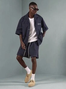 SUMWON Conjunto premium de diseñador, estilo de ropa de trabajo unisex con camisa con botones oversize y pantalón corto. Conjunto casual de fin de semana, streetwear de moda urbana y moderna para primavera y verano - Azul - Ver 1