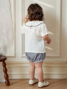 Souflis Souflis Babymeisjes Zomer Nieuwe Ruffle Kraag Voorkant Split Ontwerp Achterkant Waterdruppel Korte Mouw Streep Driehoek Casual Set