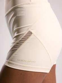 Musera Sport Quần short thể thao cạp cao có lưới thoáng khí, thích hợp cho đạp xe, chơi padel, tennis, pickleball, tập gym và thể dục. - Màu be - Xem 5