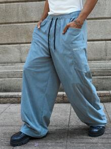 Manfinity Streetrush Pantalon large en velours côtelé pour homme, style streetwear, avec grande poche et conception de broderie de machette fendue