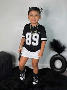 Blusa de punto holgada de manga corta con cuello en V, estilo casual de moda callejera para niña, primavera/verano - Negro - Ver 2