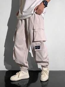 SHEIN Teen Boys 1pc Casual Hip Cool Style Loose Windbreaker Material Large Patch Pockets Street Retro College Style Cargo Pants