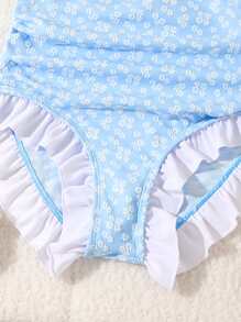 SHEIN 女童连体长袖泳衣。这款连体泳衣专为活力四射的女孩设计，采用粉色和蓝色拼色，点缀白色，带来欢快的夏日气息。柔软且富有支撑力的材质非常适合游泳和其他水上活动。荷叶边饰边赋予泳衣俏皮童趣的魅力。作为2025年的新品，它让每个女孩都能自信地展现自我。 - 藍色 - 查看 5