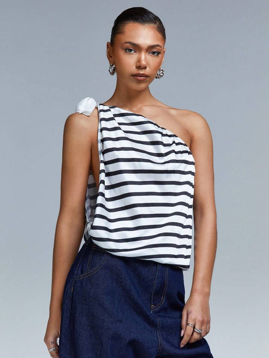 Athîral Blusa holgada casual sin mangas a rayas para mujer - Blanco y Negro - Ver 1