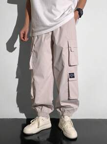 SHEIN Teen Boys 1pc Casual Hip Cool Style Loose Windbreaker Material Large Patch Pockets Street Retro College Style Cargo Pants