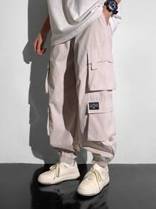 SHEIN Teen Boys 1pc Casual Hip Cool Style Loose Windbreaker Material Large Patch Pockets Street Retro College Style Cargo Pants