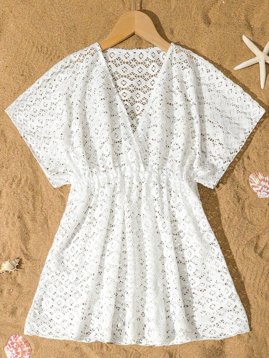 SHEIN Tween Girl' Cover Up, This Dress Style Hollow Cover Up Is Made Of High Quality Textured Solid White Fabric With A Simple And Fashionable Design. The Cinched Waist Design Highlights The Figure, Paired With Swimwear It Looks Very Exquisite. Suitable For The Personalized Needs Of Different Girls. The Ruffle Detail Makes The Swimsuit Look More Soft And Feminine. Very Suitable To Wear At The Swimming Pool Or Beach Resort, Adding Highlights To Your 2025 Travel.